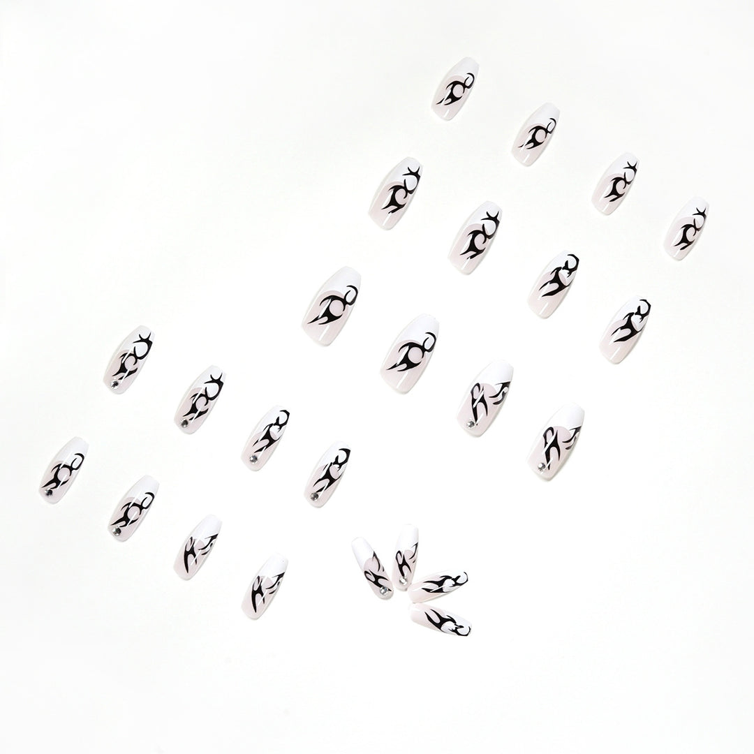 Elegant Artificial Nails with Decorative Black and Glitter Accents Stornfield