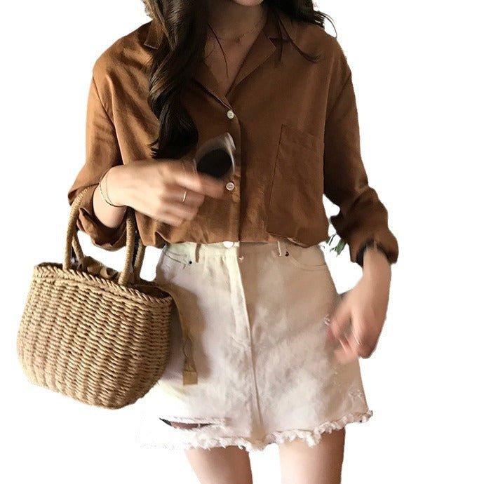 Handcrafted rattan bag with refined details Stornfield