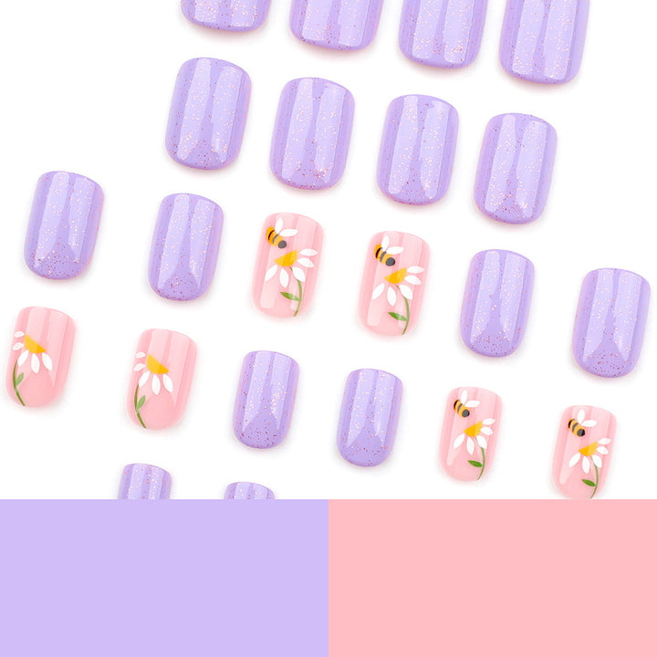 Artfully designed nail extensions with flower design Stornfield