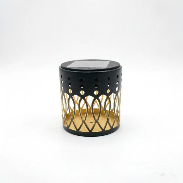 Decorative Solar-Powered Metal Lantern With Geometric Cutout And Warm LED Candle Effect Stornfield