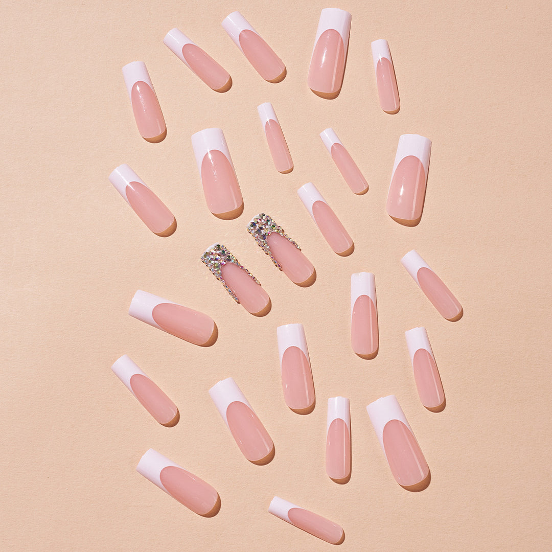 Acrylic nail set with filigree accents and glitter embellishments Stornfield
