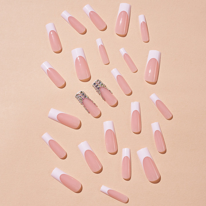 Acrylic nail set with filigree accents and glitter embellishments Stornfield