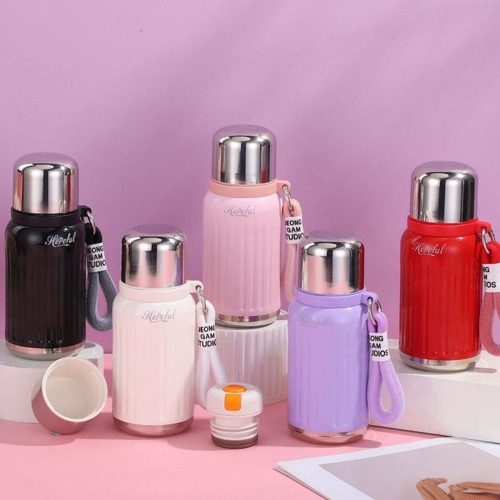 Unisex double-walled insulated bottle with one-handed safety lock and removable drinking cup Stornfield