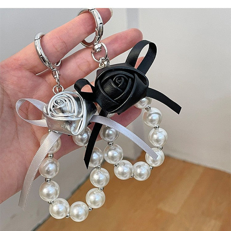 Elegant Pearl and Leather Charm Keychain Stornfield