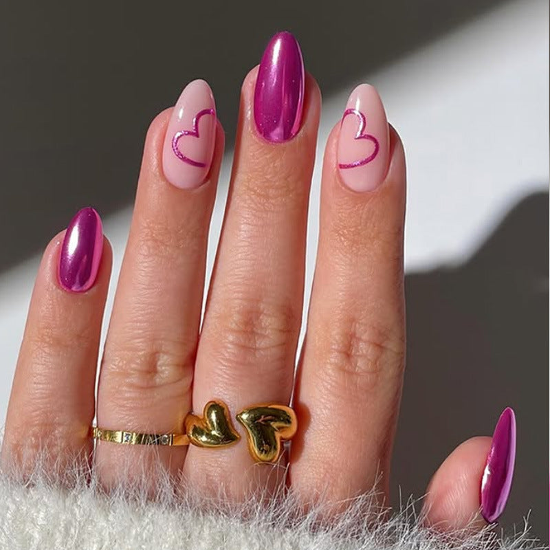 Artificial nail set with romantic heart design and glamorous accents Stornfield