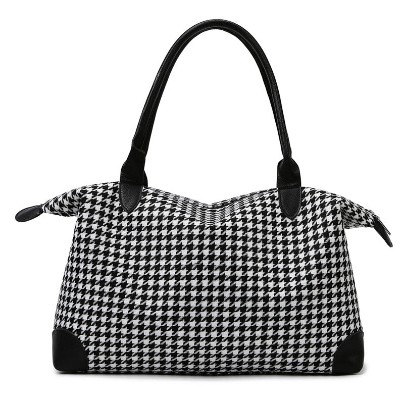 Fashionable handbag in timeless houndstooth pattern Stornfield