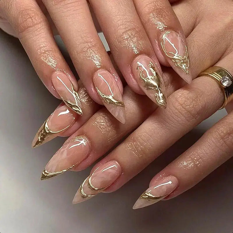 Elegant Stiletto Nail Enhancements with Gold Accent Details Stornfield