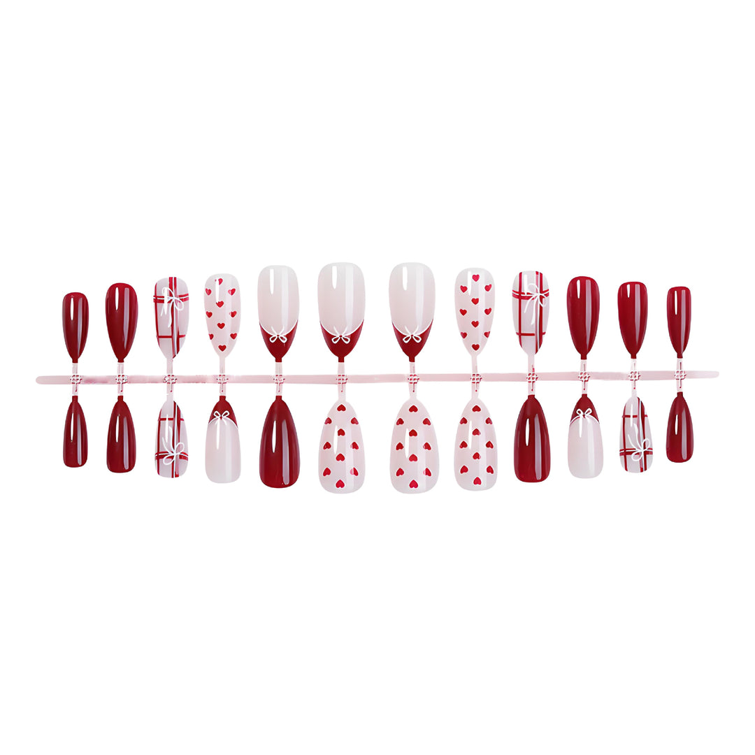 Nail set with playful hearts and elegant bows Stornfield