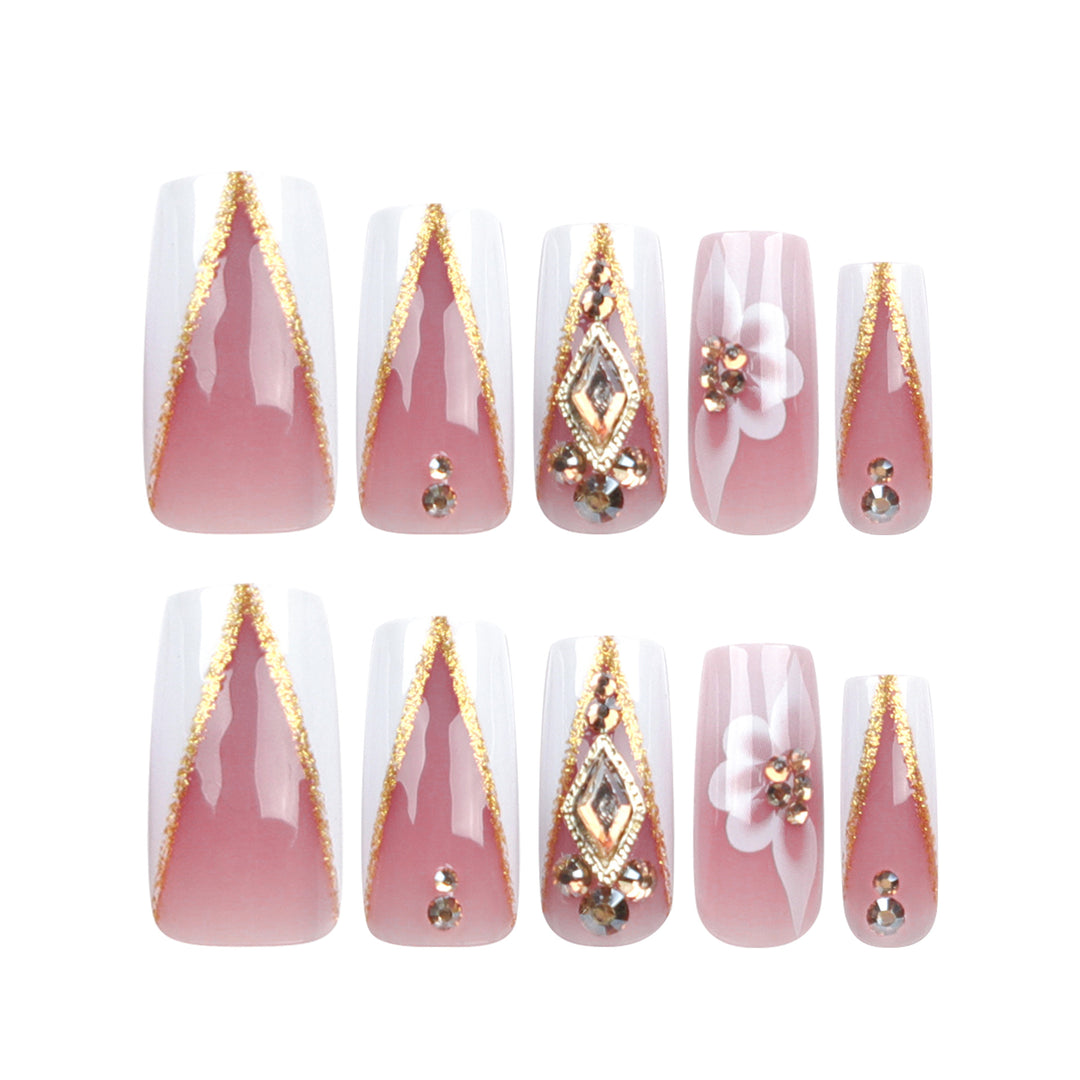 Artistic nail extensions with floral and glitter accents Stornfield