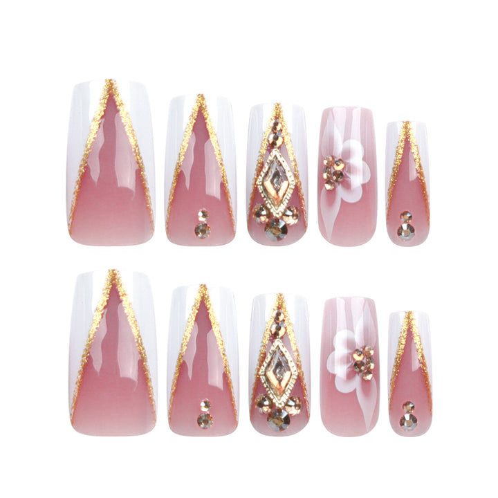 Artistic nail extensions with floral and glitter accents Stornfield