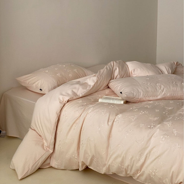 Romantic cotton satin bedding with embroidered butterfly and floral relief