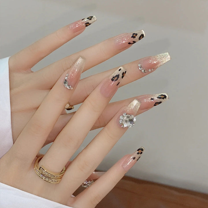Artificial nail set with glitter and leopard design Stornfield