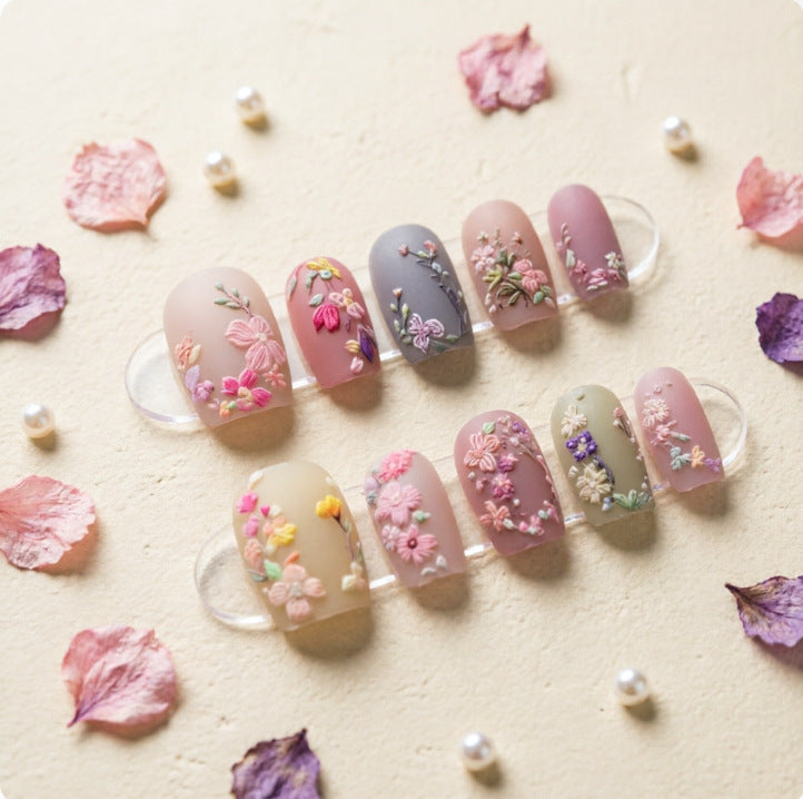 Art nail design with floral motifs Stornfield