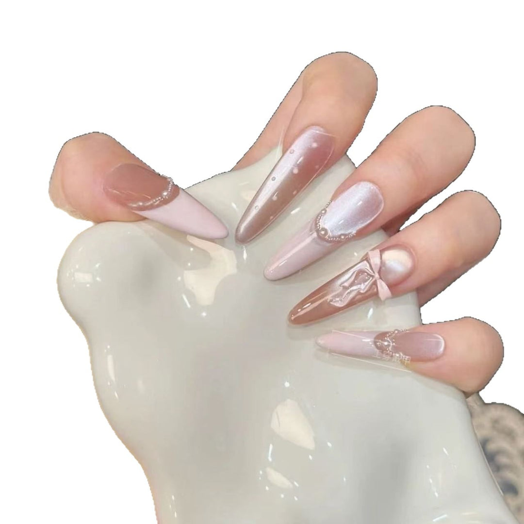 Glamorous artificial nail tips with elegant decorations Stornfield