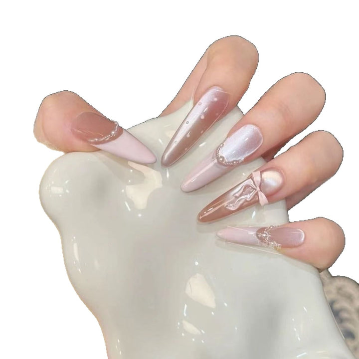 Glamorous artificial nail tips with elegant decorations Stornfield