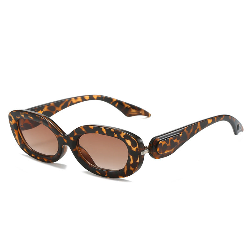 Ladies stylish sunglasses with elegant, curved frame Stornfield