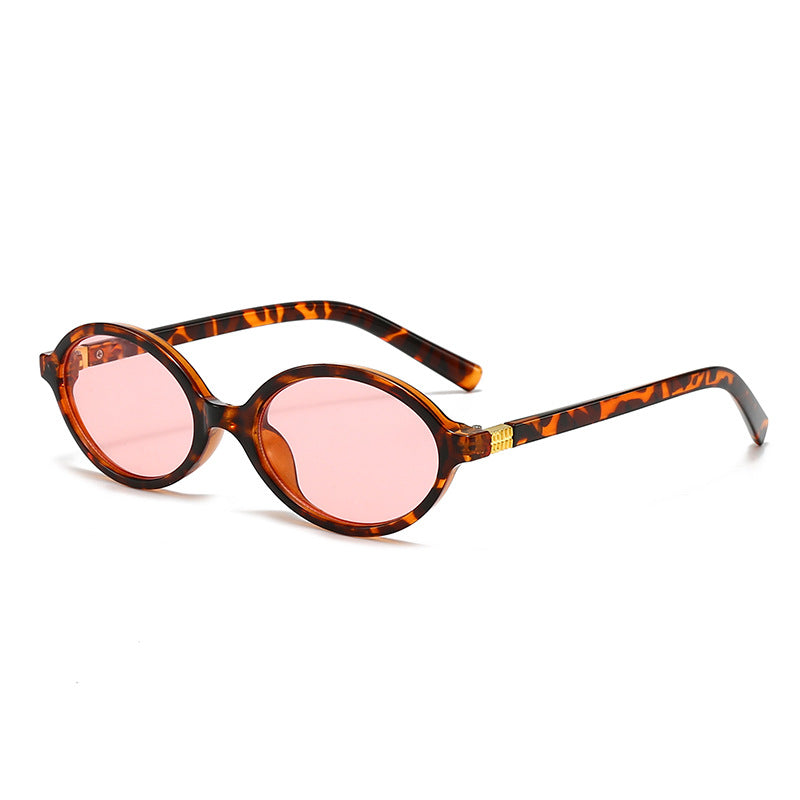 Women's fashionable oval glasses with golden accents Stornfield
