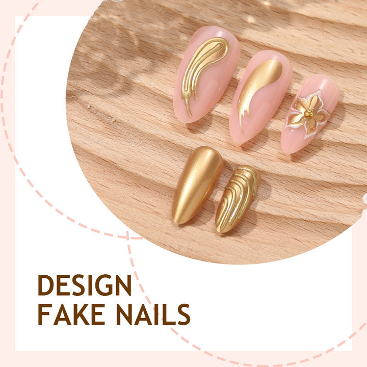 Creative nail art set with luxurious gold embellishments Stornfield