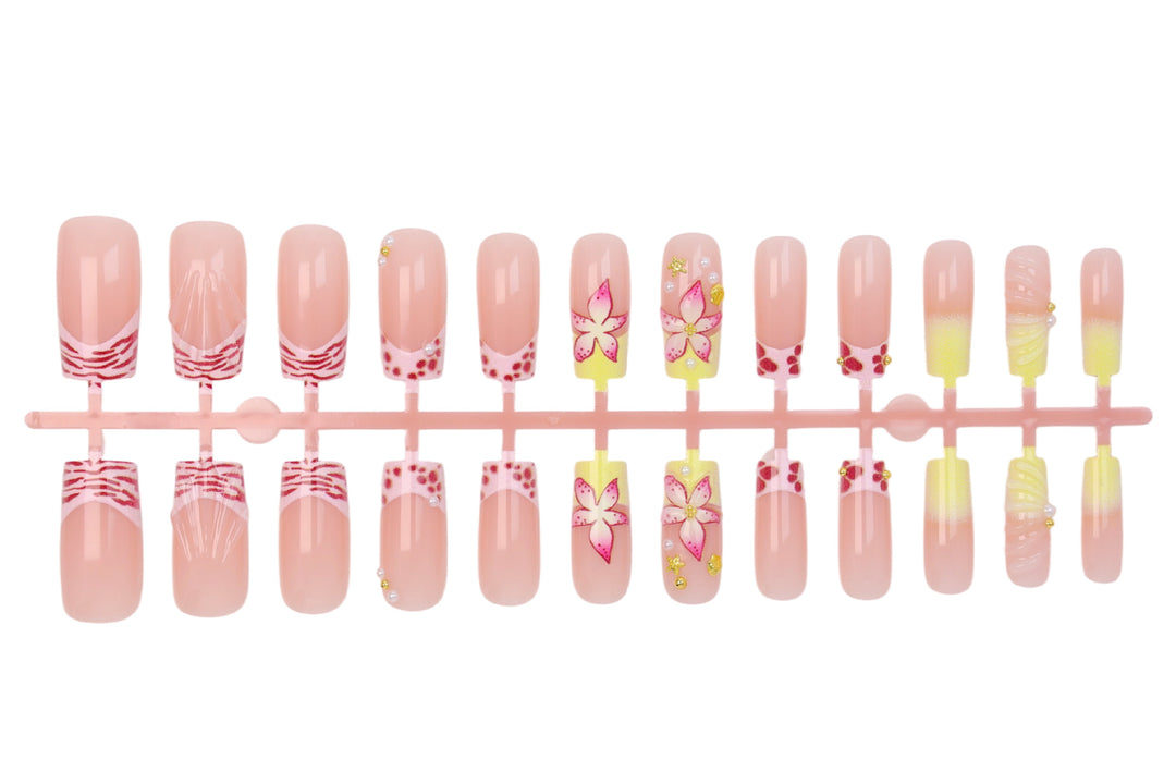 Nail art set with floral accents and glitter decorations Stornfield