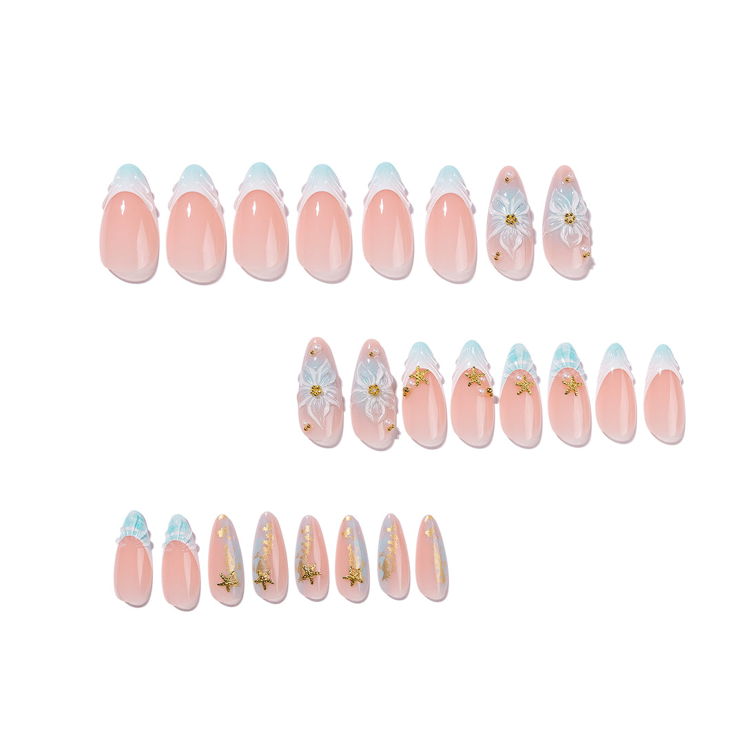 Artful stiletto nails with floral and glamorous accents Stornfield