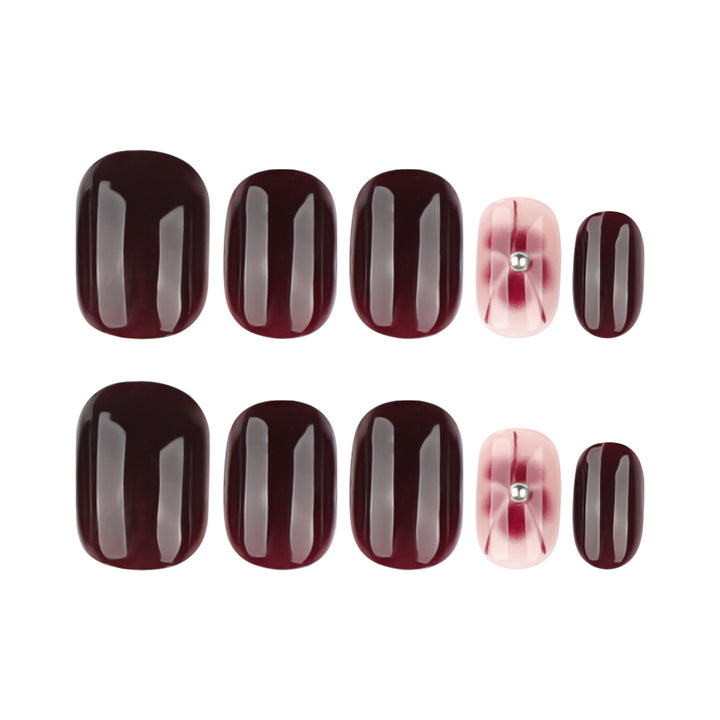 Elegant Nail Art with Glitter and Flower Elements Stornfield
