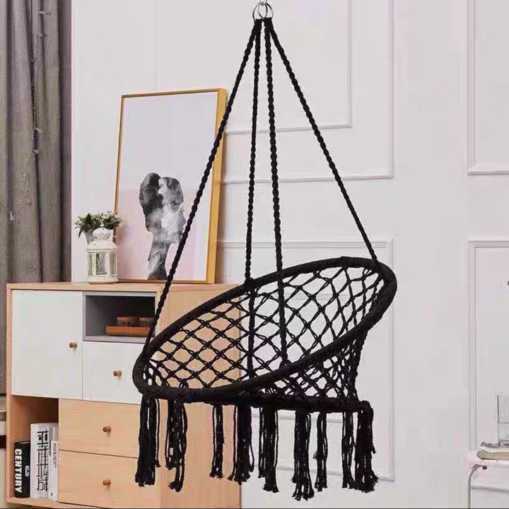 Boho macrame hanging swing chair with faux fur cushion and fringe Stornfield