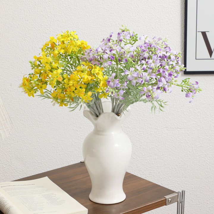 Decorative artificial flower arrangement