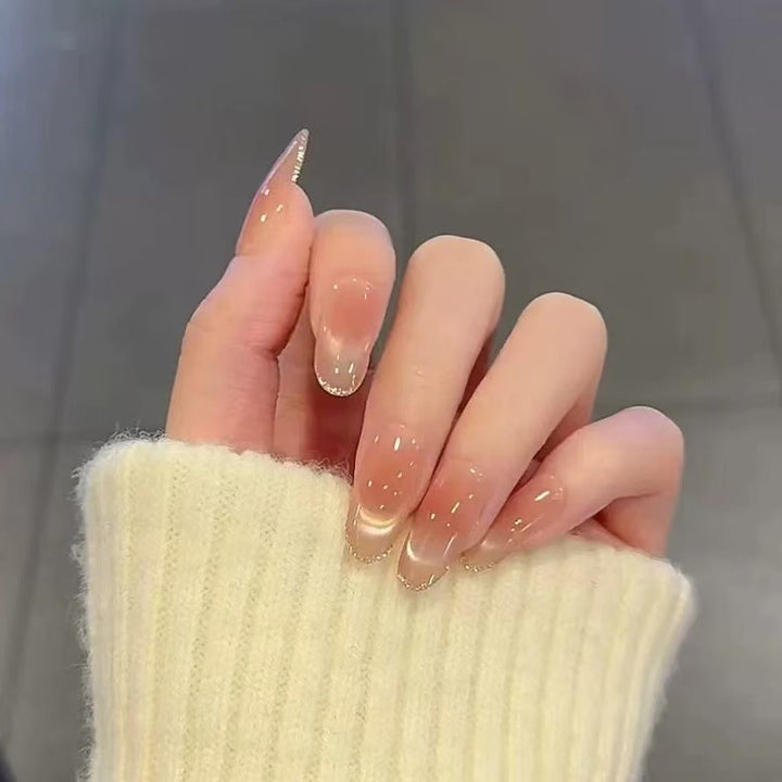 Artificial nails in elegant French manicure design Stornfield