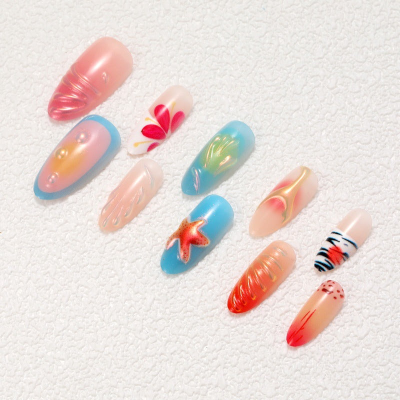 Artistic nail tips with maritime motifs Stornfield