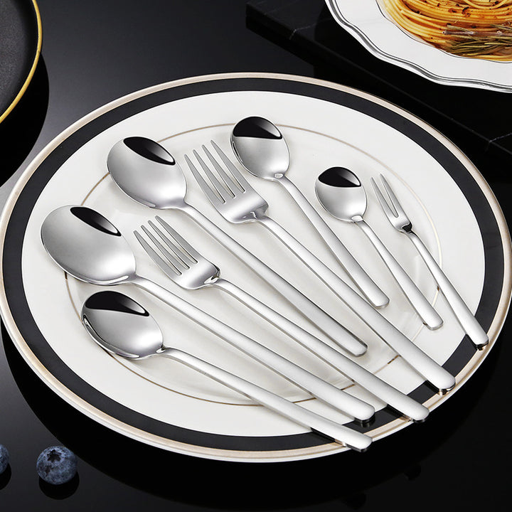 Elegant dessert spoon with luxurious golden surface Stornfield