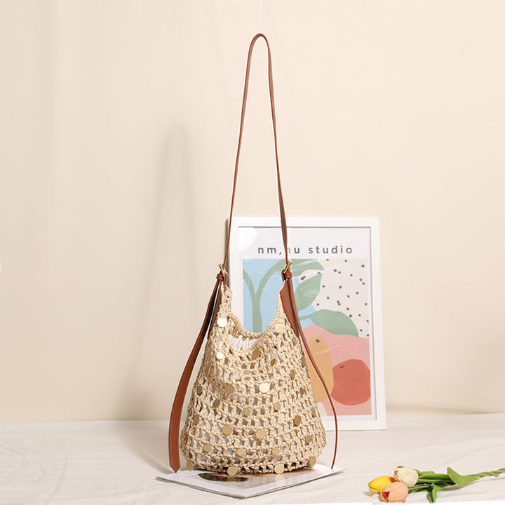 Hand-knotted shoulder bag with metal appliqués Stornfield