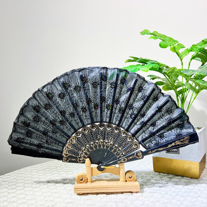 Women's folding fan with artistic decorations Stornfield