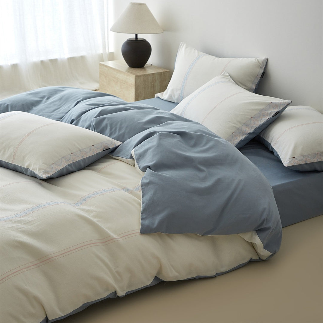 Reversible Cotton Sateen Duvet Cover Set with Decorative Embroidered Stripe and Matching Pillow Shams