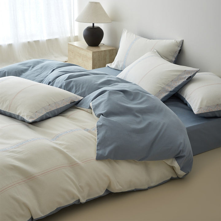 Reversible Cotton Sateen Duvet Cover Set with Decorative Embroidered Stripe and Matching Pillow Shams