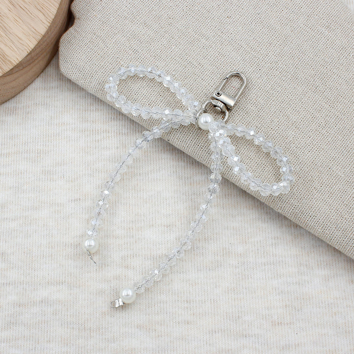 Elegant Pearl Bow Keychain Stornfield