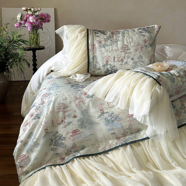 Satin bedding set with ruffled bed skirt and vintage toile print