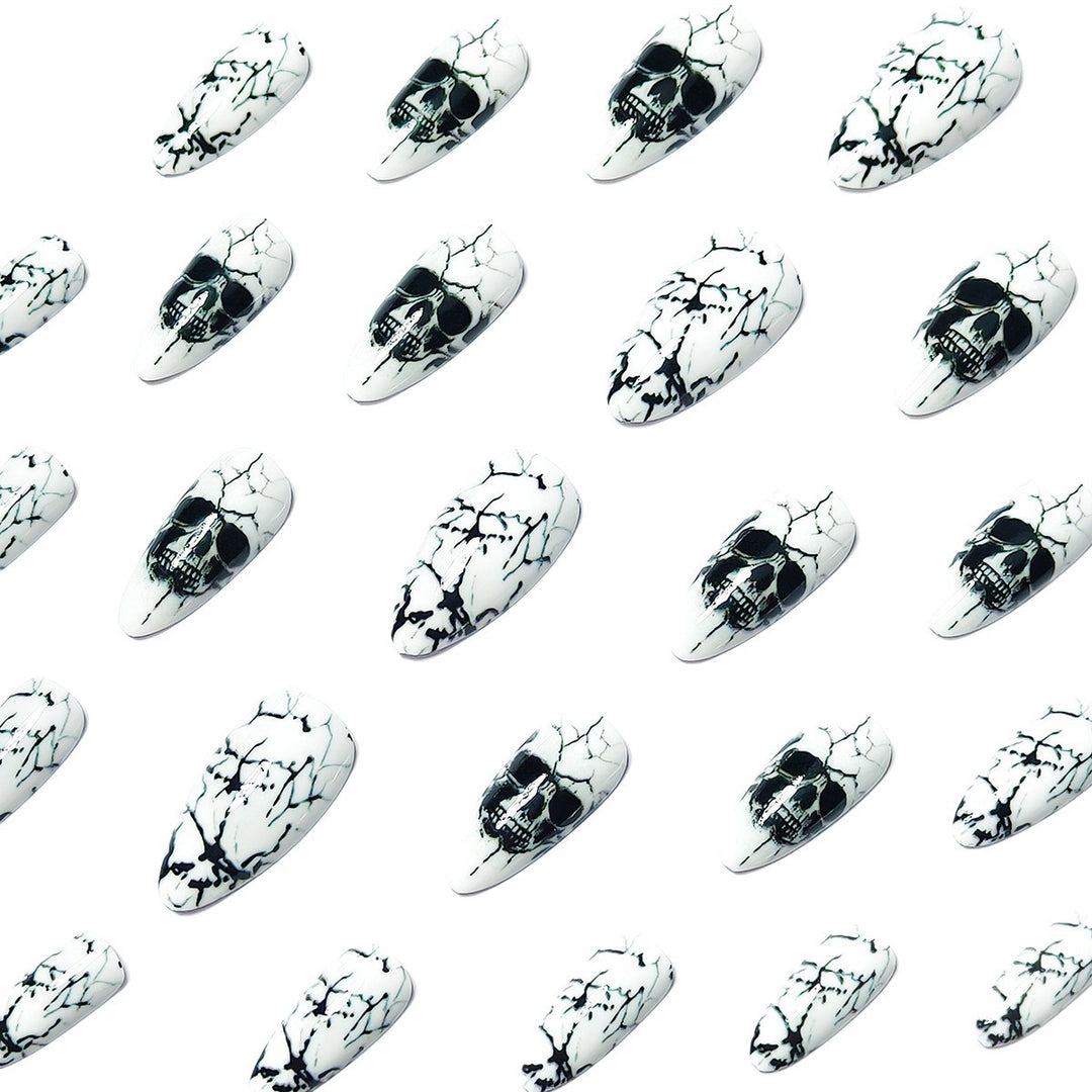 Artificial nails with playful skull design and crackle effects Stornfield