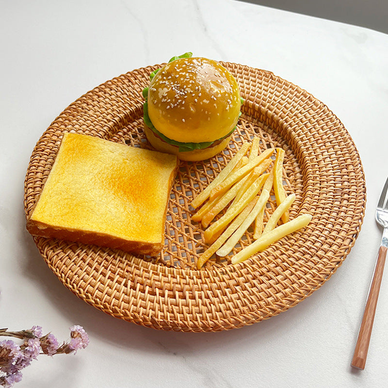 Ladies' round serving platter made of hand-woven natural material Stornfield