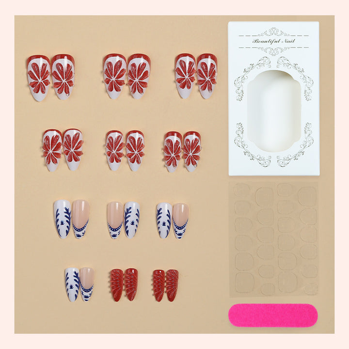 Artificial nail set with floral and elegant designs Stornfield