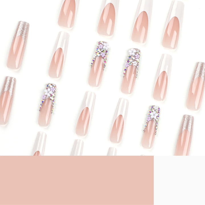 Artful Nail Extensions with Glitter and Flower Decor Stornfield