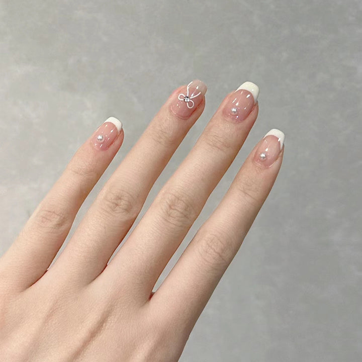 Decorative French Tip Press-On Nail Set with Bow Accents Stornfield
