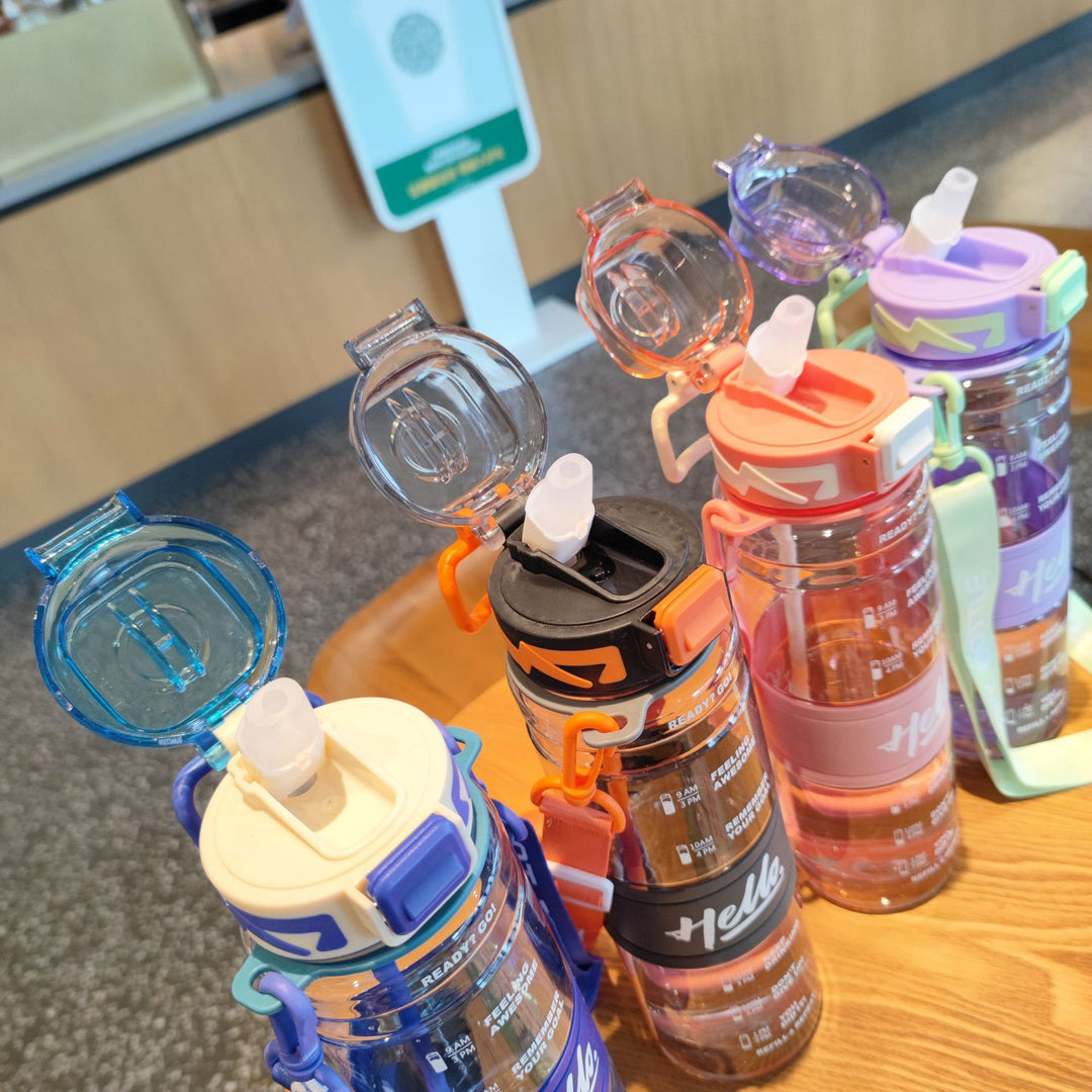 Women's large sports water bottle with motivational time markings Stornfield