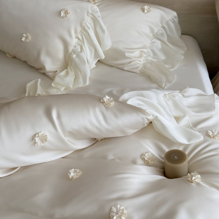 Luxurious satin bedding set with ruffles and 3D flowers