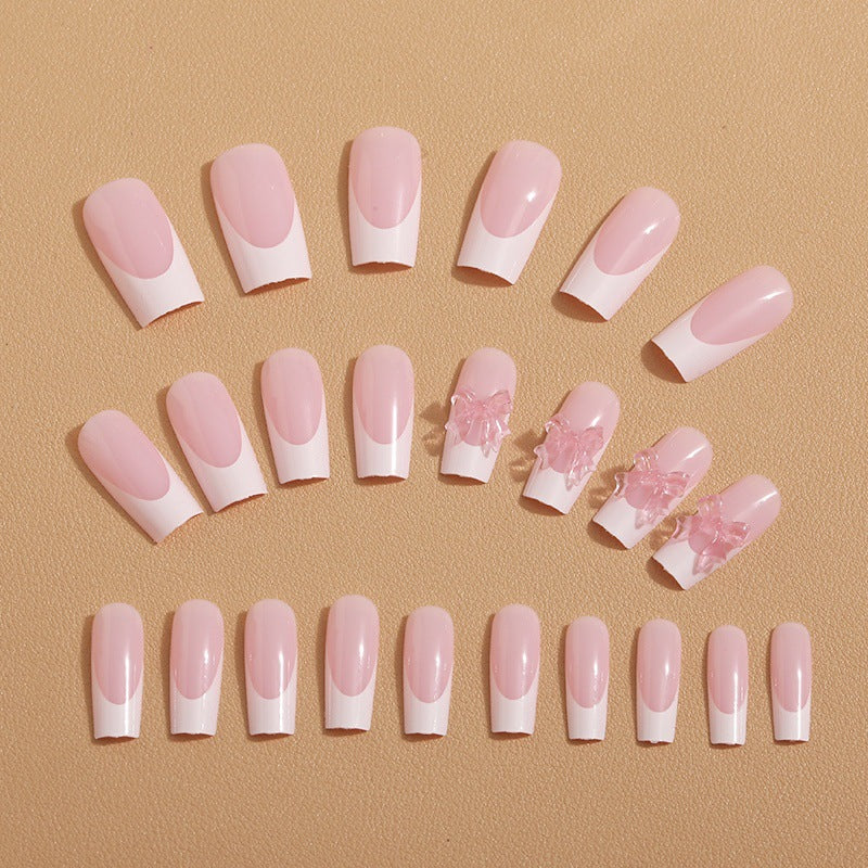 Artificial nail tips with delicate bow decorations Stornfield