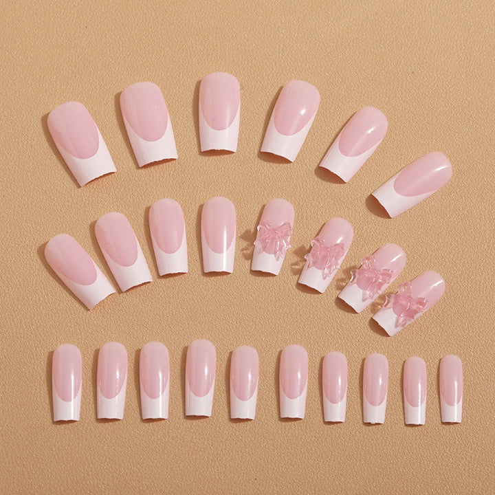 Artificial nail tips with delicate bow decorations Stornfield