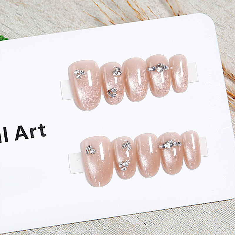 Artificial nail set with elegant rhinestone embellishments Stornfield