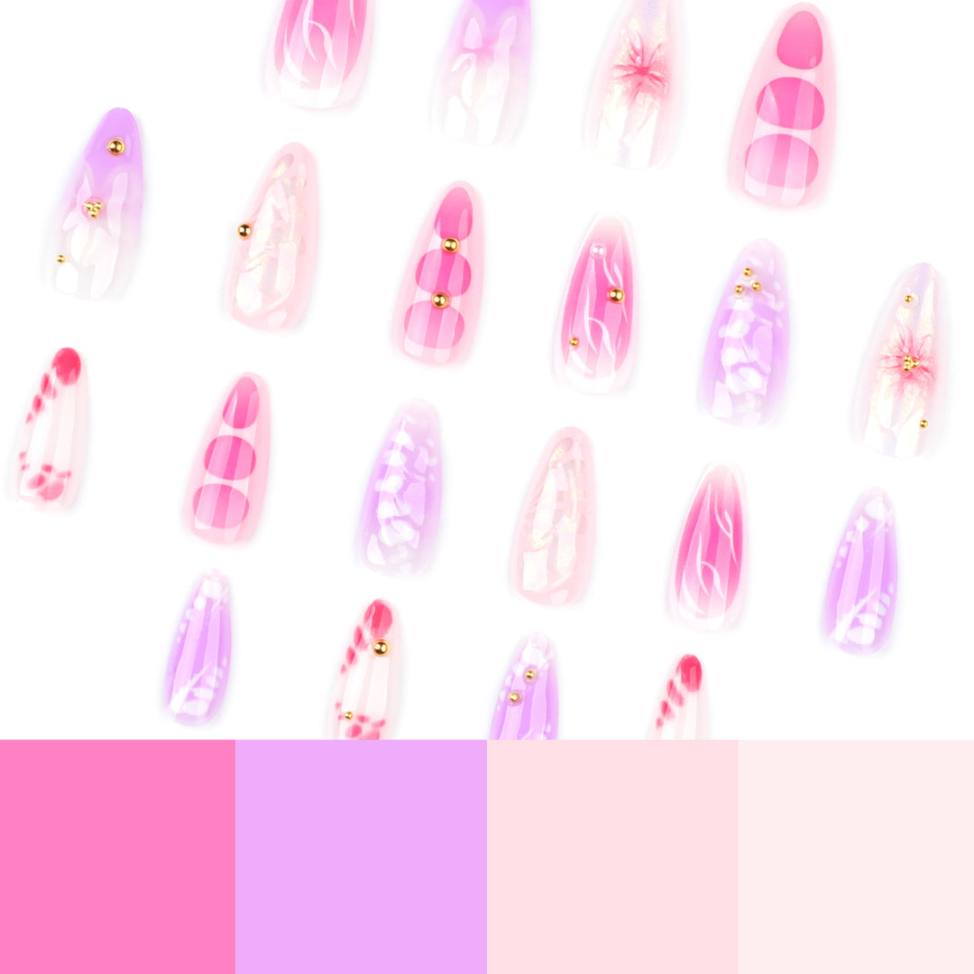 Artful Nail Extensions with Floral Patterns and Rhinestone Embellishments Stornfield
