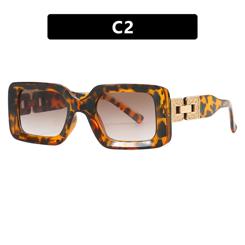 Women’s fashionable sunglasses in elegant square design with luxurious golden accents Stornfield