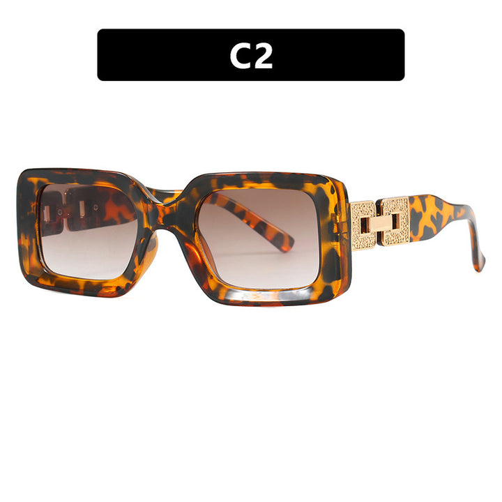 Women’s fashionable sunglasses in elegant square design with luxurious golden accents Stornfield