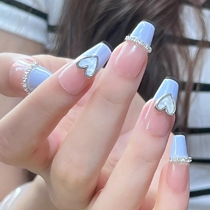 Artificial nails with romantic heart and glitter decorations Stornfield